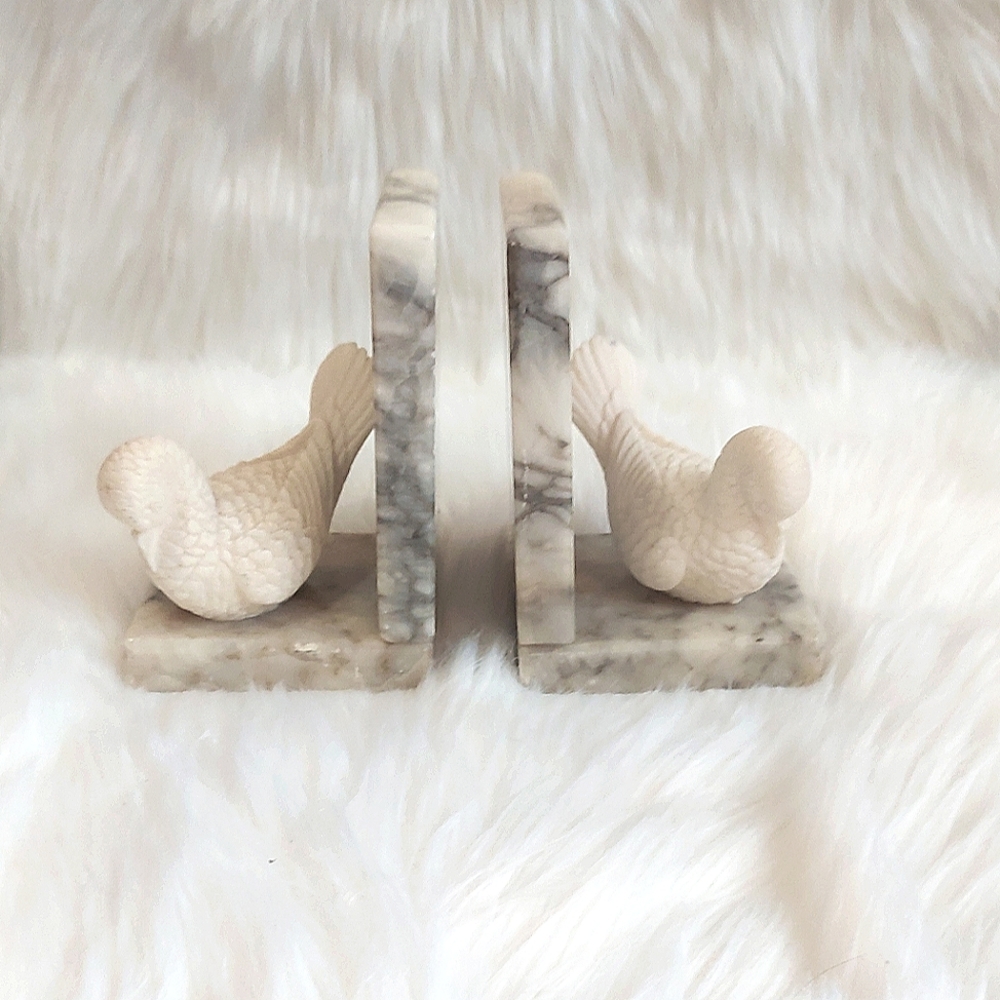 Stone bookends birds